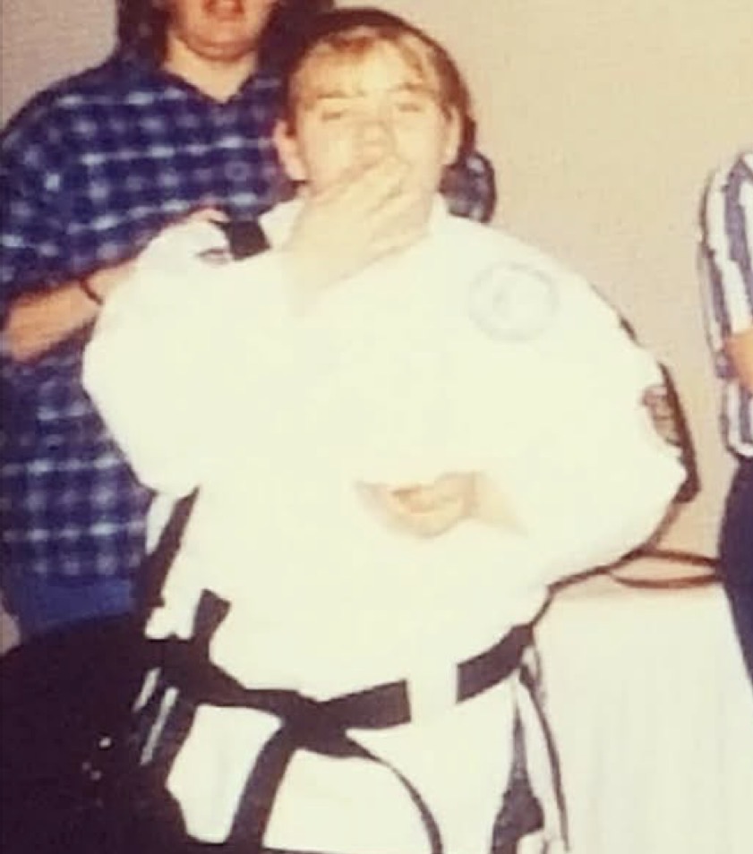 Michelle in her childhood martial arts uniform.