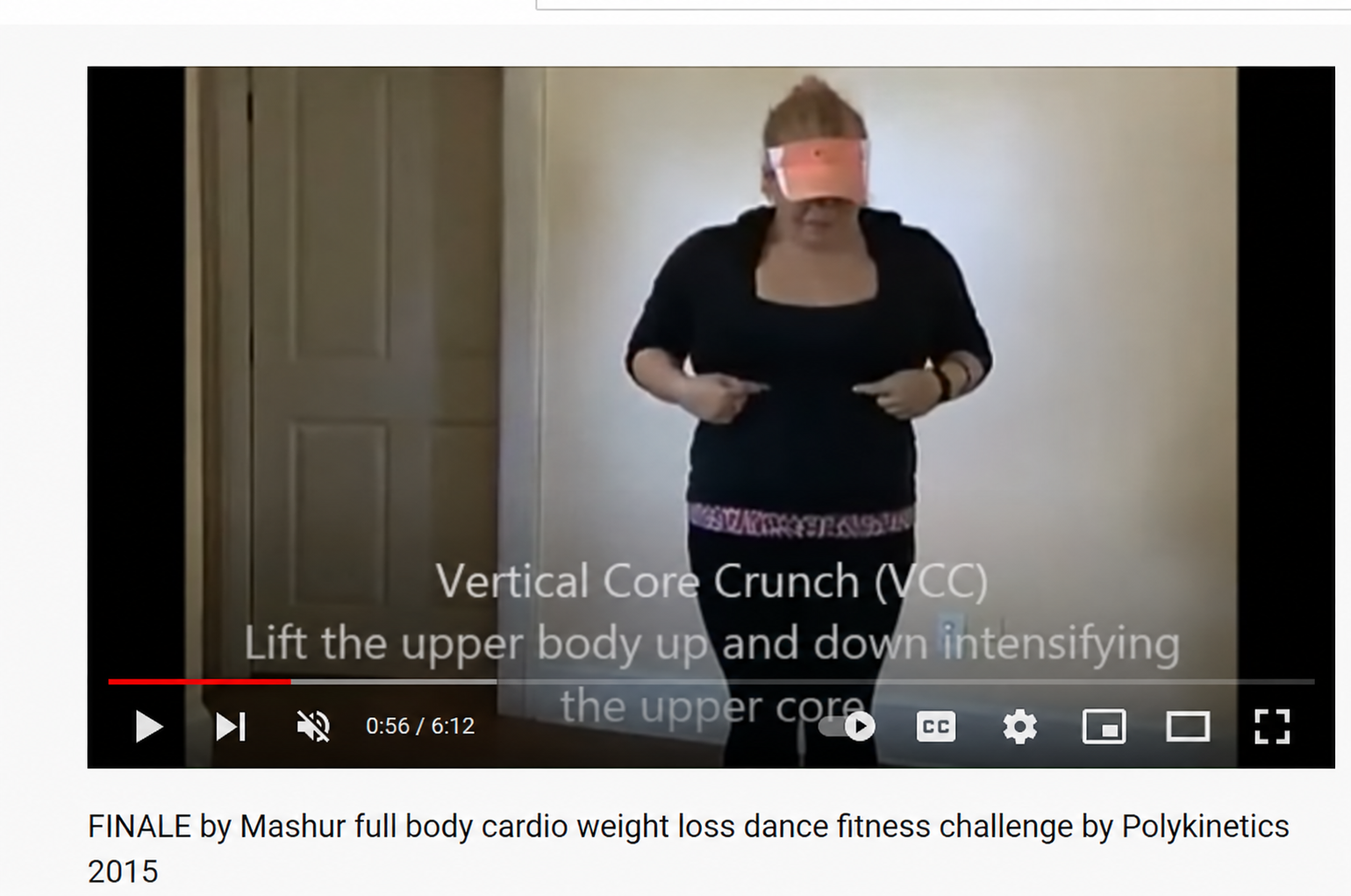 Screenshot of Michelle’s early Polykinetics YouTube video demonstrating the Vertical Core Crunch (VCC) in 2015, with the background advertisement removed.